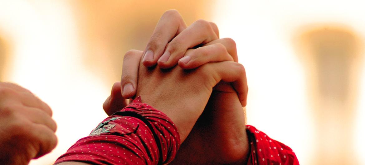 Hands intertwining, union, commitment