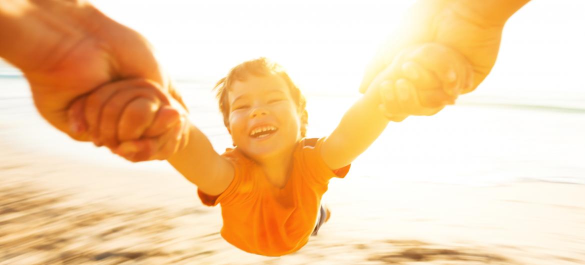 child playing with his father